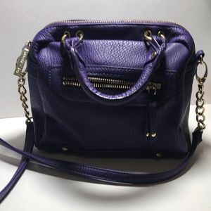 purple Olivia and joy purse.